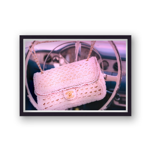 Vintage Chanel Lady Bag On Classic Car Steering Wheel