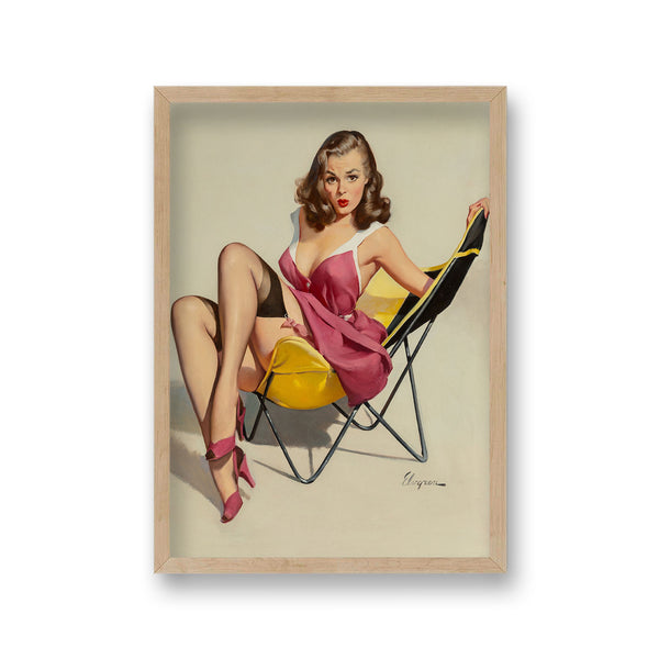 1960'S Inspired Pin Up Girl In Low Beach Chair Showing Black Stockings Beneath Pink Summer Dress